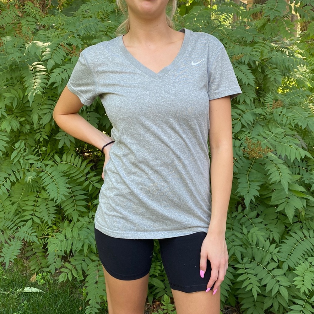 Ladies Nike Dri-Fit, running / athletic shirt.  Size small.